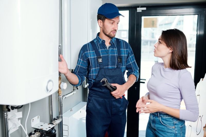 Plumber working in a home